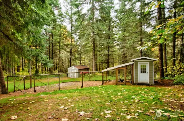 Chicken House with fenced yard. storage shed in back