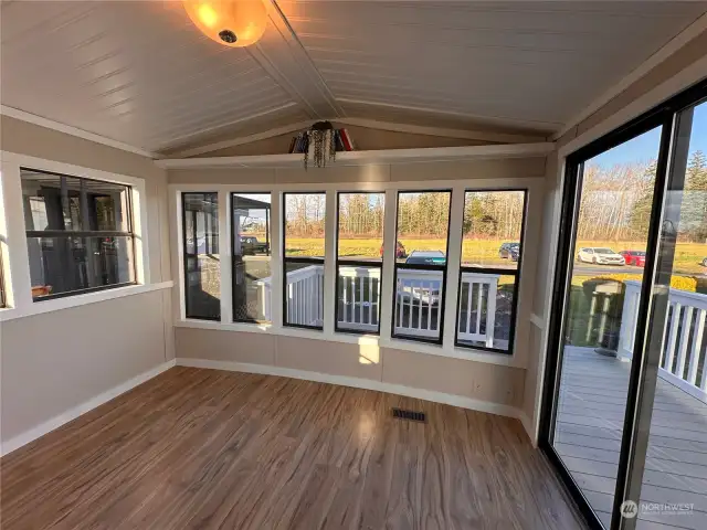 Living area with slider to front deck