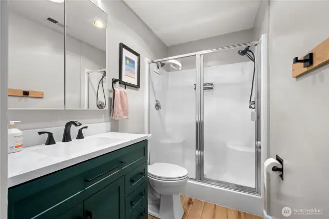 En-suite bathroom off of primary bathroom has been recently renovated