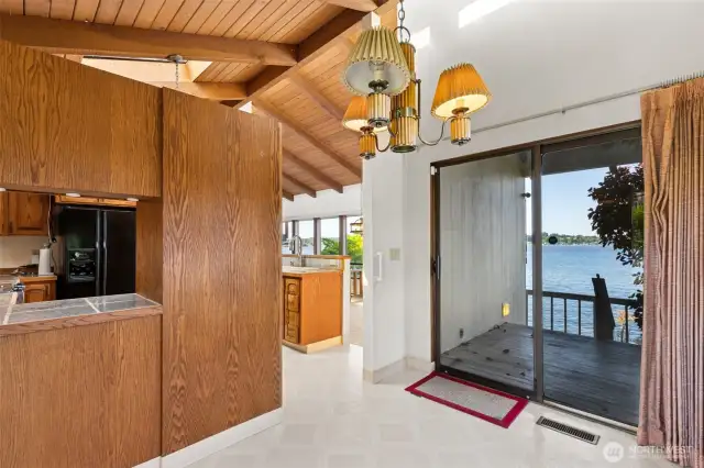 Eating space off of the kitchen with deck access
