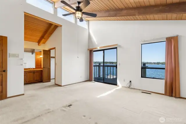 Primary bedroom with private deck, fireplace and en-suite