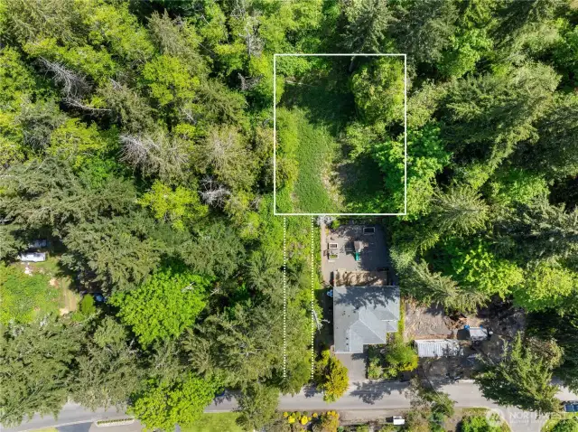 Property is accessed via a 12' wide easement to the left of the neighboring house.