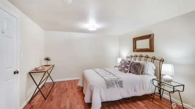 This spacious primary bedroom offers plenty of room for both comfort and creativity — design it your way!