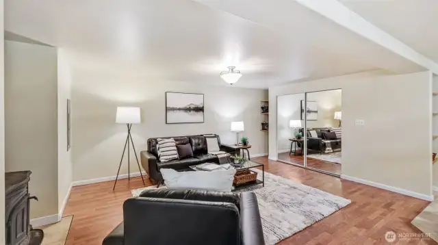 This open living area offers plenty of room to customize with your favorite furniture, artwork, and frames. Plus, enjoy convenient cubby storage and double mirrors on the closet for added style.