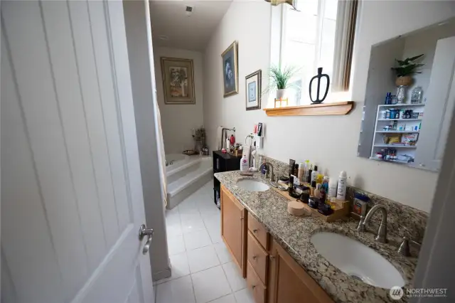 Primary bath with large shower and jetted tub