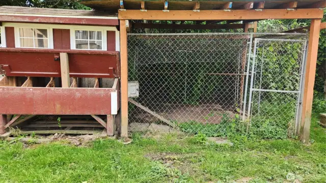 Small chicken coop and fenced in for small animals.