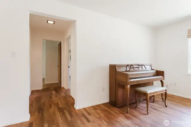 Hallway to two bedrooms and full bath.