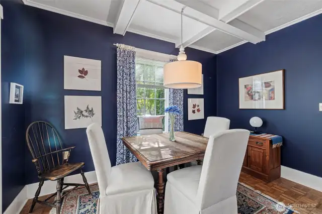 Parquet flooring adds a touch of vintage warmth to the room.