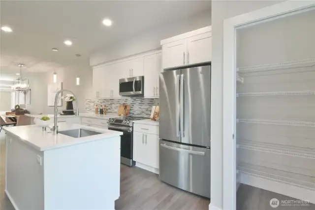 Stainless steal appliances throughout kitchen