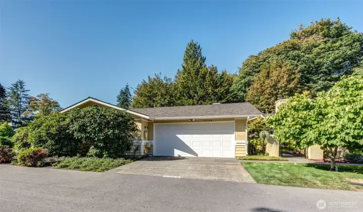 Great Level Site, No steps! 2 Car Garage with 2 spots in driveway.