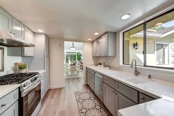 Kitchen, view into Dining & Living