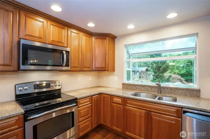 Enjoy a beautiful view of the backyard from the bay window above the sink.