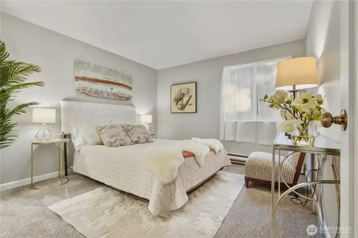 Step into your spacious primary bedroom with ensuite bath.