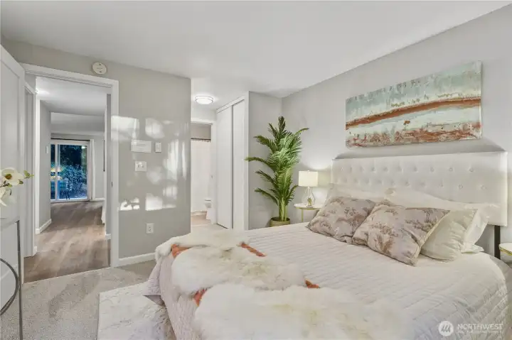 Generous walk-in closets; corner adjacent to the bathroom.