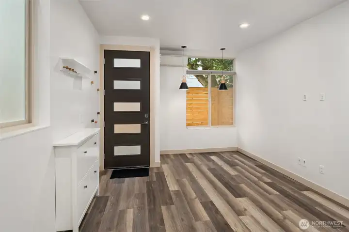 Main floor living area with front door.