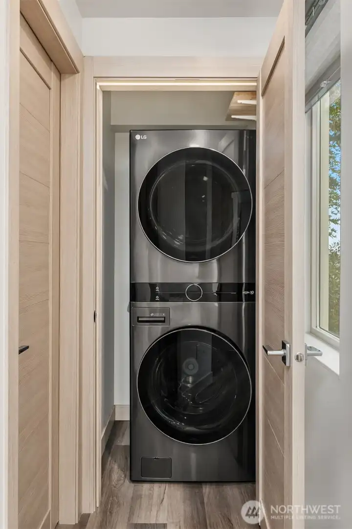 Full size washer dryer on third floor.