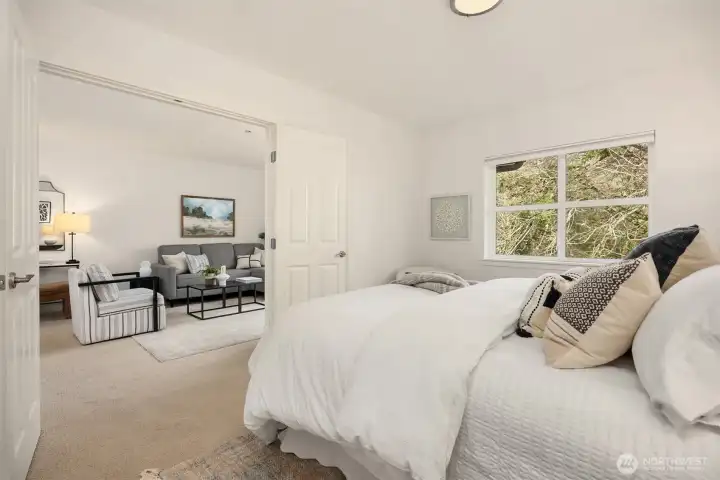 Private bedroom retreat opens effortlessly to the main living area, creating an easy, connected flow while still feeling tucked away.