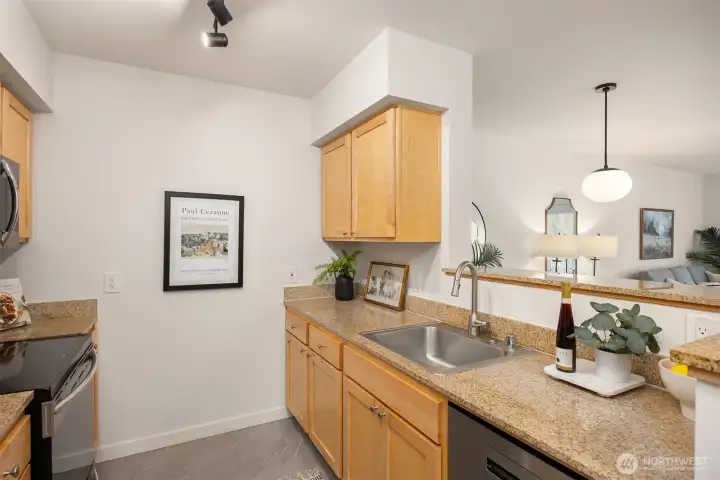 Functional kitchen design offering ample storage and workspace while remaining connected to the main living area.