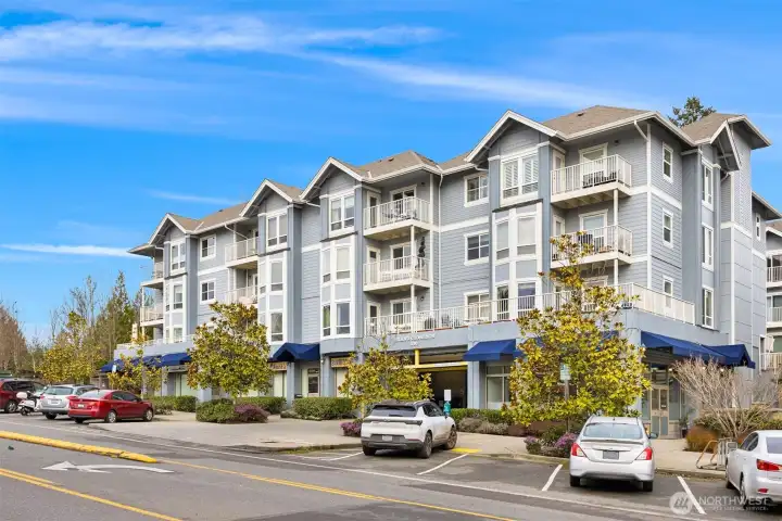 Well-maintained mixed-use building featuring ground-level retail, secured garage parking, and convenient elevator access.