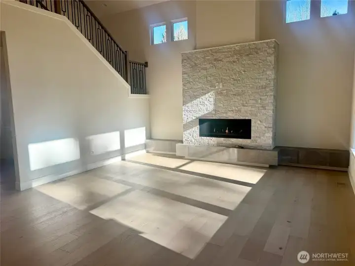 Huge Great room has big windows offer lots of Natural Light.