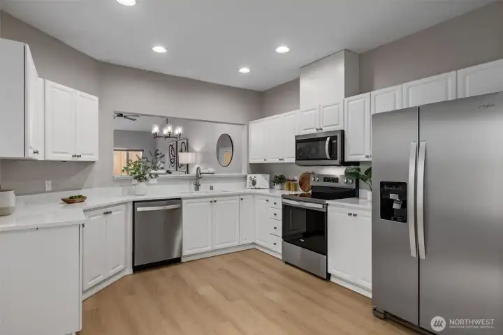 Renovated kitchen with brand new quartz countertops and appliances