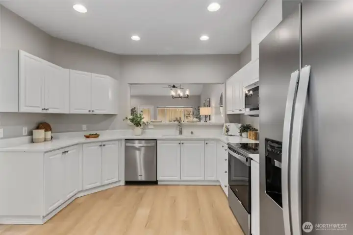 Renovated kitchen with brand new quartz countertops and appliances