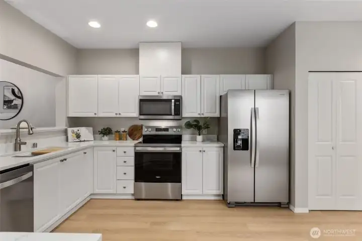 Renovated kitchen with brand new quartz countertops and appliances