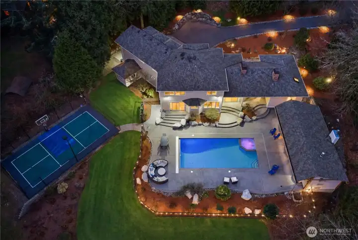 Resort-style living in Sammamish! Grass added digitally where lawn was re-seeded.