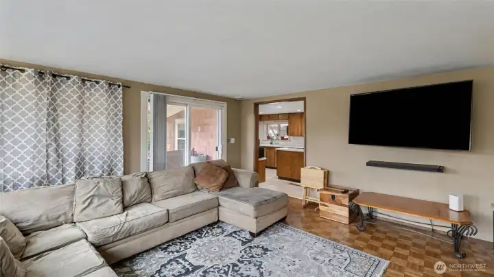 Slider off living room leads to covered deck for you to enjoy the beautiful river.