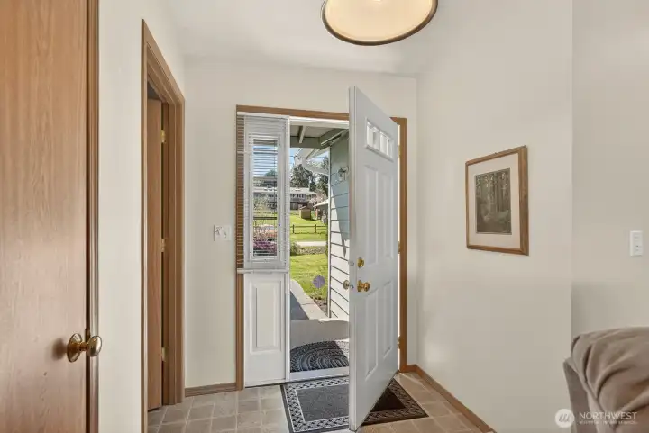 Spacious entryway with ample closet space.