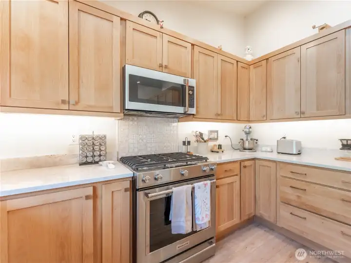 Updated stainless kitchen appliances replaced just 3 years ago for modern convenience.