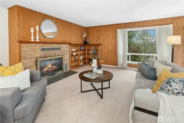 Enjoy the cozy wood burning fireplace in the living room.