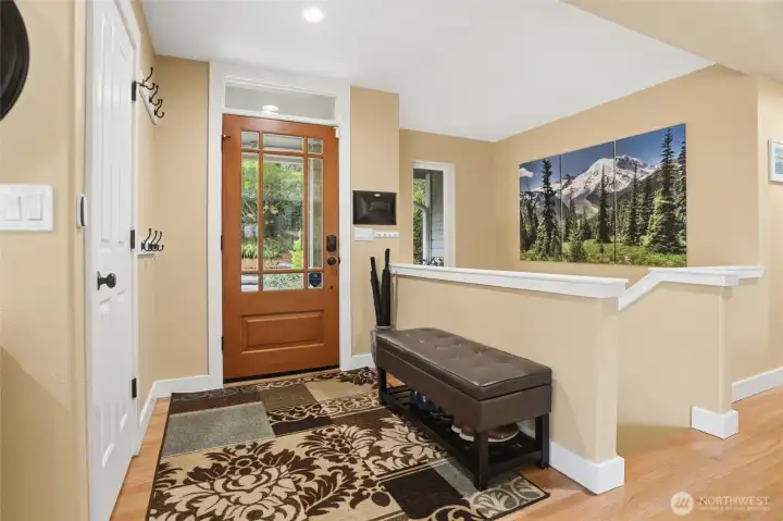 As you enter this home, you are greeted by warm oak flooring and a setting that will make you feel like you live in a treehouse.