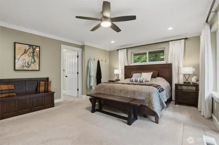 Another view of the primary suite, which includes its own primary 5-piece bath and walk-in closet.