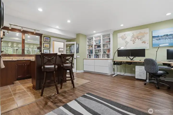 This room is a great entertaining space and is currently used as another office.