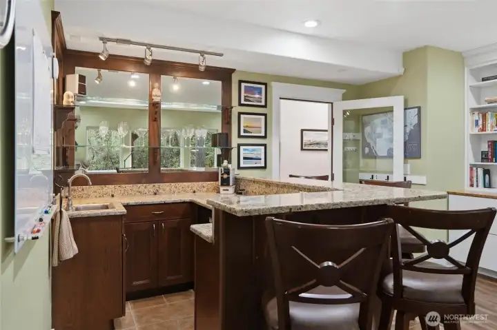 This amazing bar with room to entertain is perfect in the lower level bonus space.