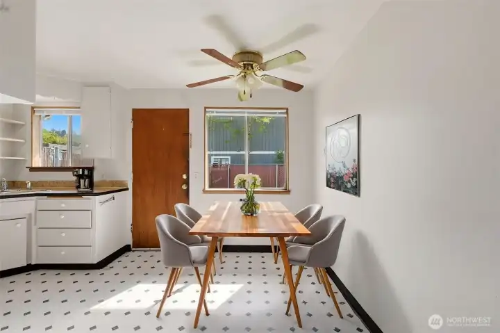 Dining area shown virtually staged