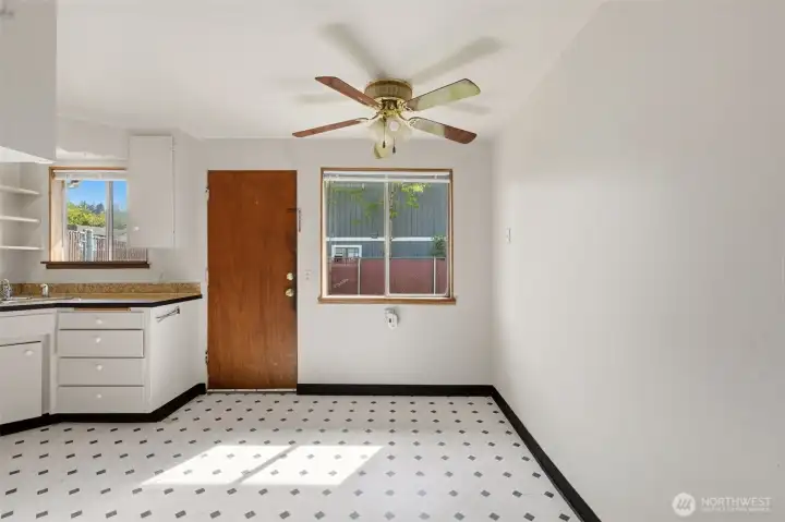 Dining area with door to backyard.