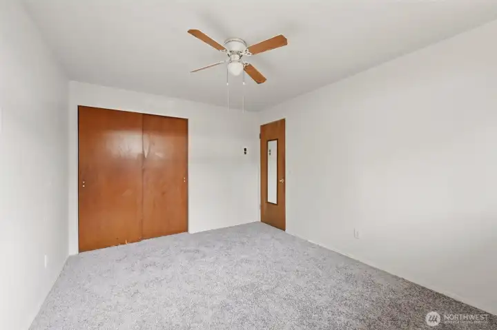 This view shows the bedroom closet.