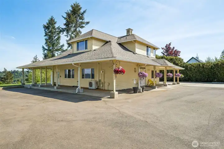 The covered wrap-around porch and large flat driveway enhances both curb appeal and functionality, offering multiple entry points that support flexible living arrangements. The covered wrap-around porch and large flat driveway enhances both curb appeal and functionality, offering multiple entry points that support flexible living arrangements.
