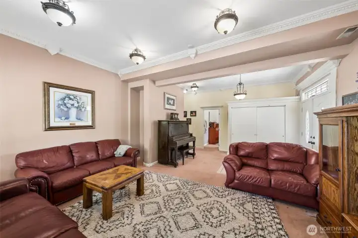 Just off the entry welcomes guest to an inviting and large formal living area. Just off the entry welcomes guest to an inviting and large formal living area.