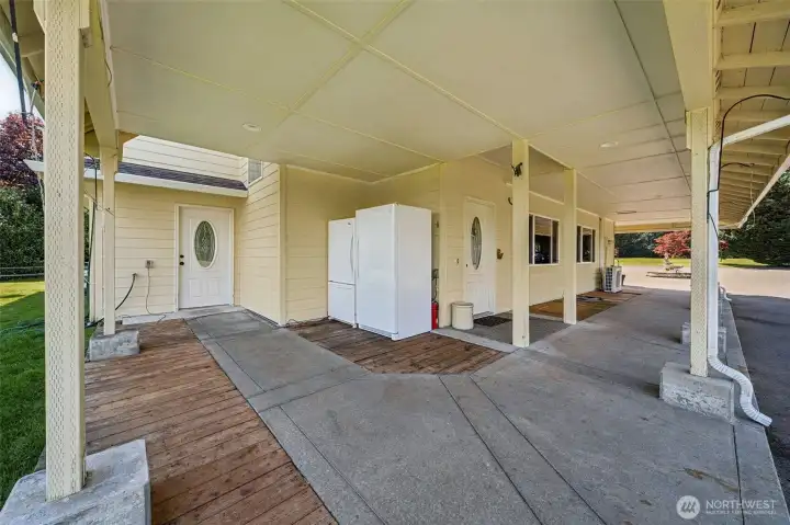 Wrap around patio offers easy access to both the kitchen & the main floor formal living area. Wrap around patio offers easy access to both the kitchen & the main floor formal living area.