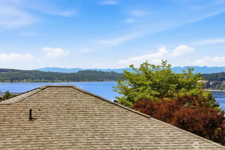 You will love this view from your deck...the calming blue waters of Puget Sound bordered by the magnificant Olympic Mountains.