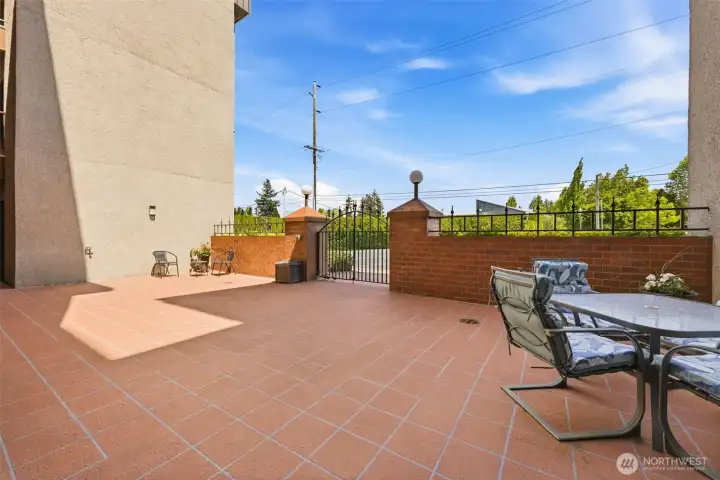 The entry Courtyard invites you to bring your green thumb and display your talent with floral container gardening. This is a perfect place to enjoy the summer days an evenings ahead.