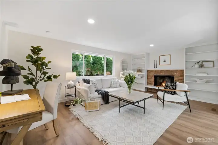 This back living room is a large gathering space. Or, curl up by the fire with a good book. This back living room is a large gathering space. Or, curl up by the fire with a good book.