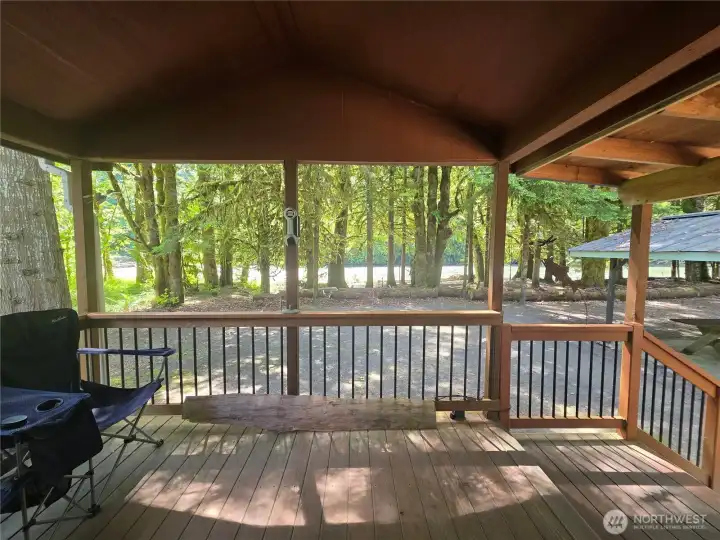 Covered porch off the living room looking toward the river