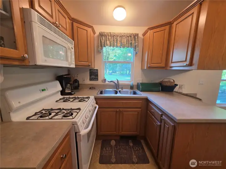 kitchen has propane cooking stove
