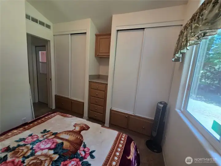bedroom built in storage and closets
