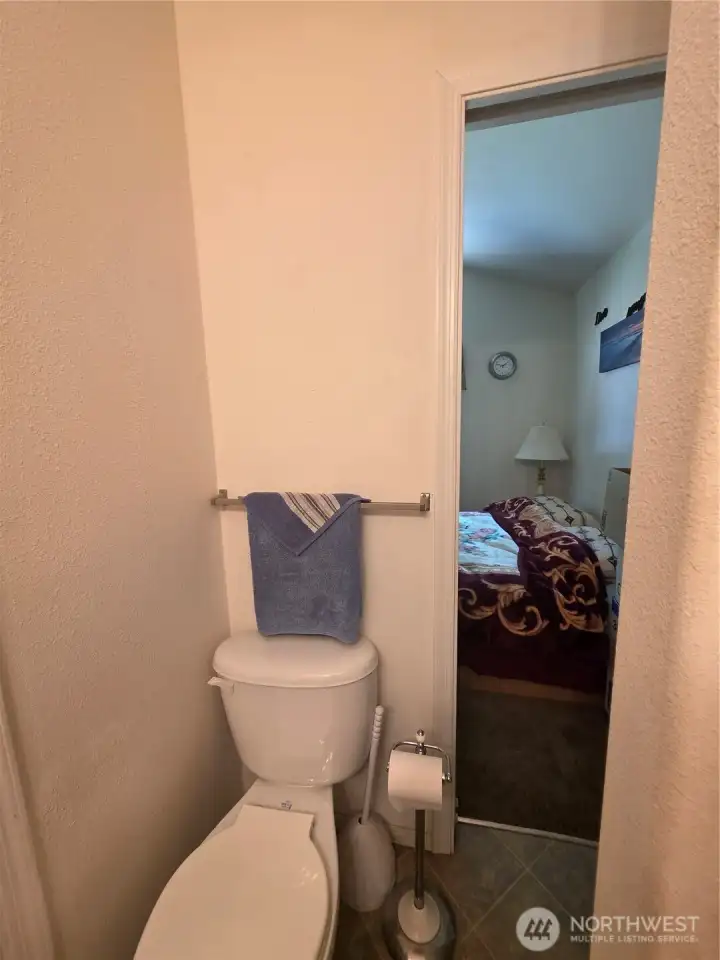 bathroom with connecting door to bedroom