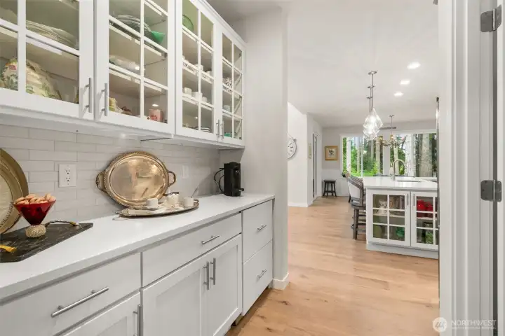 The coveted butlers pantry. Far left drawers are a beverage fridge and ice maker, helping take your hosting to the next level. Walk-in pantry to the right The coveted butlers pantry. Far left drawers are a beverage fridge and ice maker, helping take your hosting to the next level. Walk-in pantry to the right